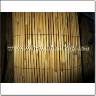 Natural peeled reed fence for garden or constructions