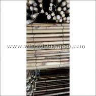 white fern fencing of brown color plastic wire lines woven for garden